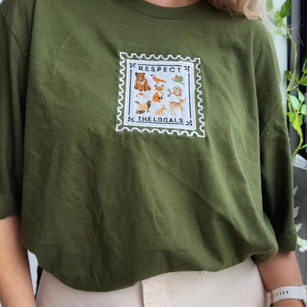 NWT Olive Green Woodland Animals Respect the Locals Stamp Embroidered Tee